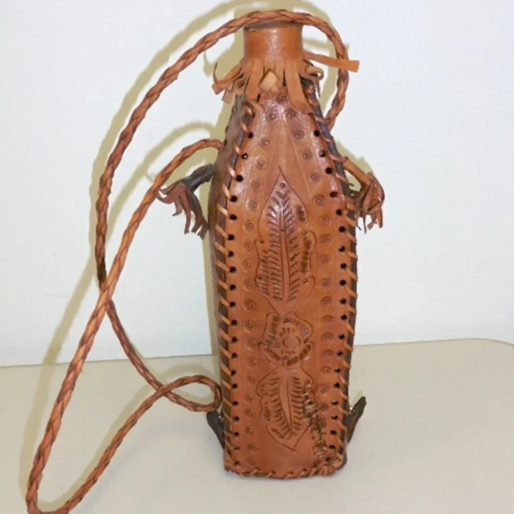 Vintage HAND TOOLED bird LEATHER BOTTLE HOLDER strap barware